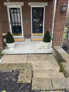 Sunken and uneven concrete steps leading to a home, a problem expertly repaired by A1 Concrete Leveling Cincinnati/NKY in Cincinnati, OH.
