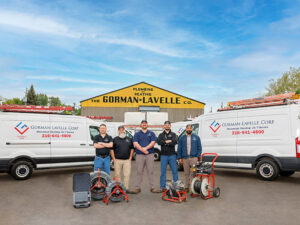 A team of Gorman-Lavelle Corp service professionals with their vans and plumbing equipment in Cleveland, OH