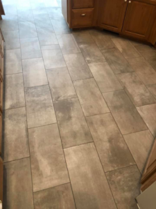New tile flooring installed in a kitchen by Stapleford Flooring LLC in Milford, DE.