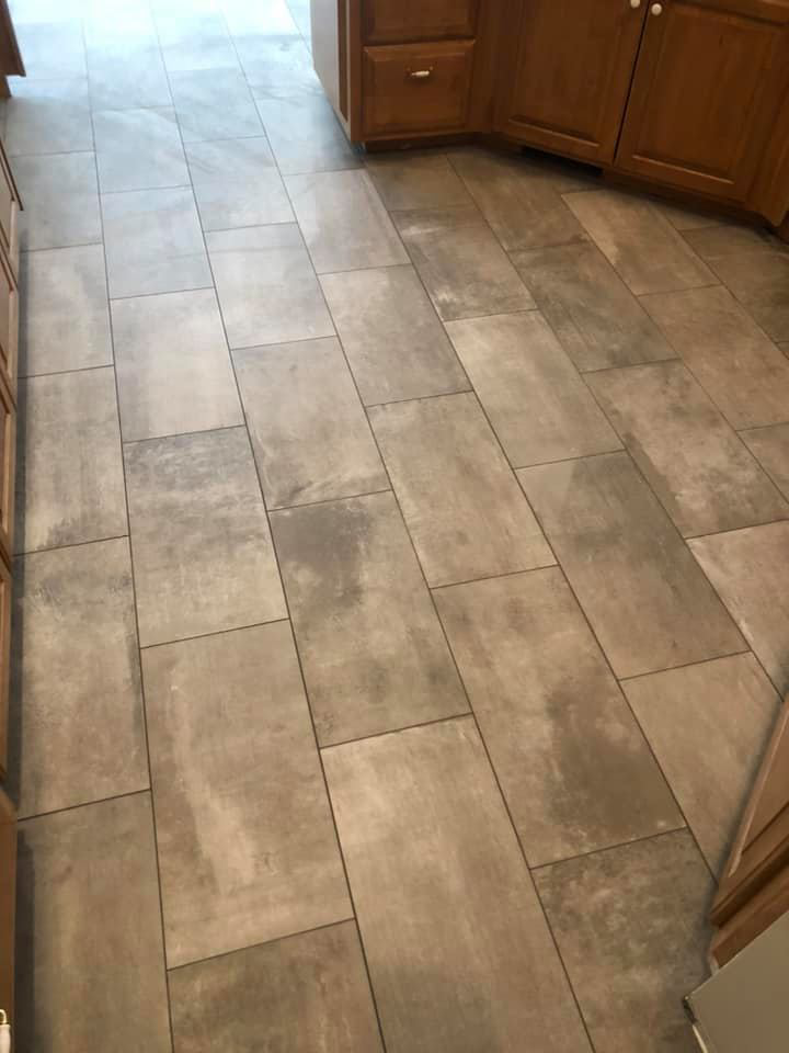 New tile flooring installed in a kitchen by Stapleford Flooring LLC in Milford, DE.