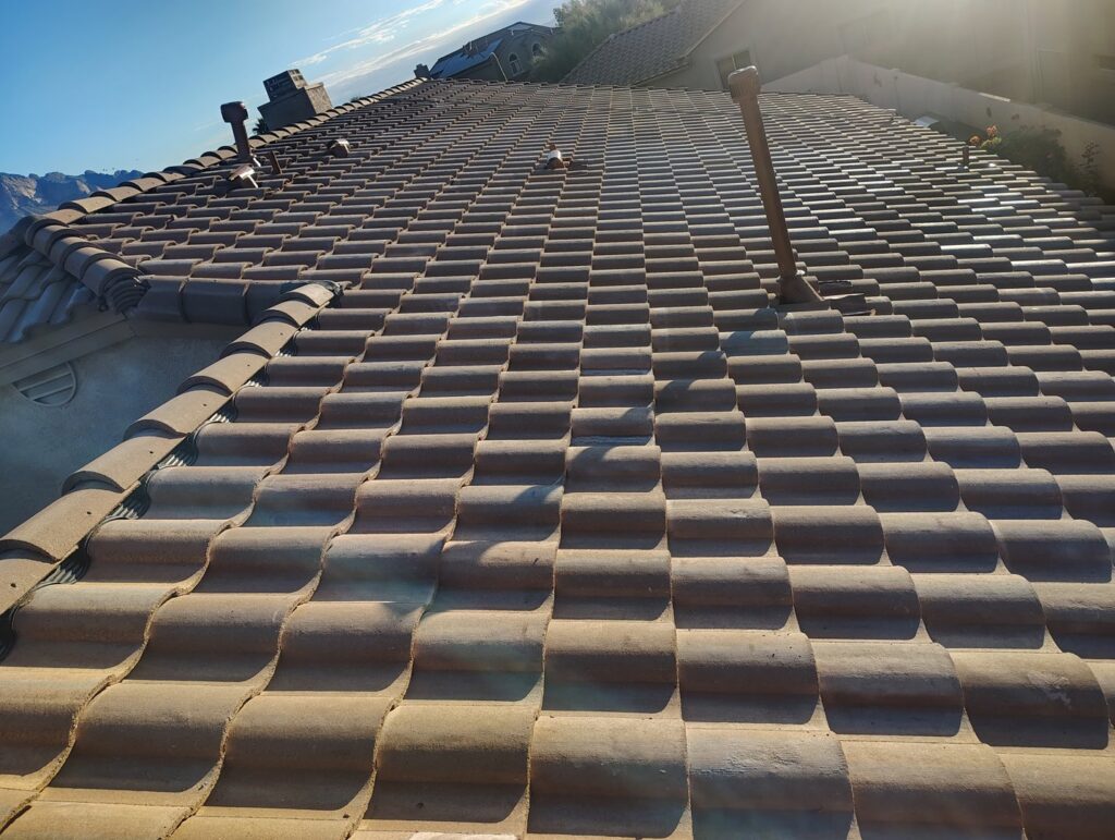 A tile roof with a properly installed pipe vent by Mayitos roofing LLC in Tucson, AZ.