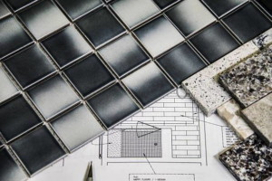 Tile samples and blueprints for home renovation services by C & E Sprinkler, your handyman in Spokane, WA.
