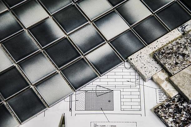 Tile samples and blueprints for home renovation services by C & E Sprinkler, your handyman in Spokane, WA.