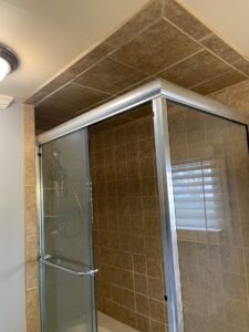 A newly installed tiled shower and bathtub enclosure by Luis handyman service in Albuquerque, NM