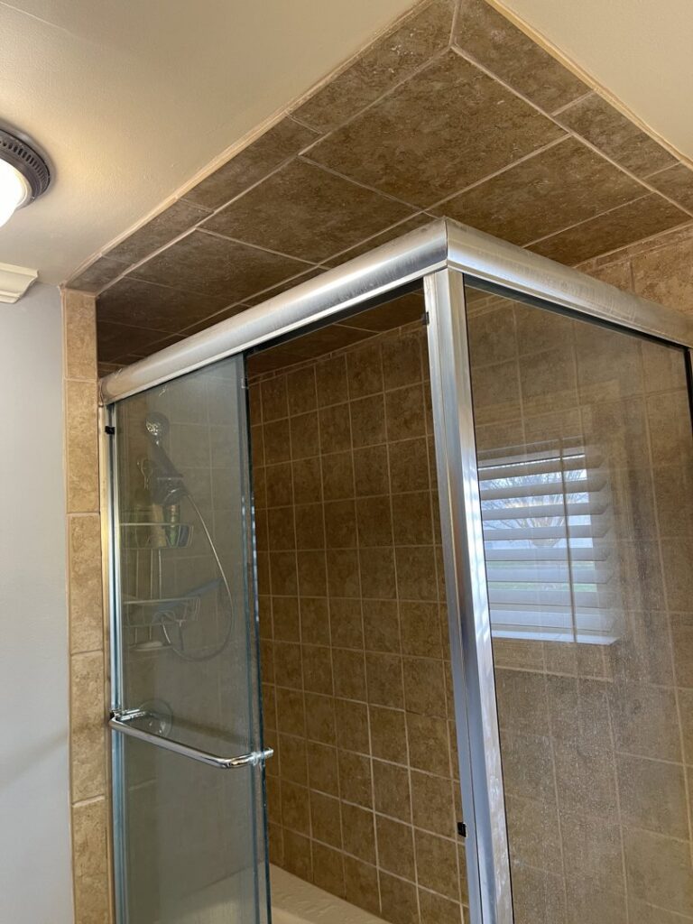 A newly installed tiled shower and bathtub enclosure by Luis handyman service in Albuquerque, NM