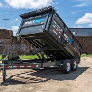 A Mobiledumps dumpster trailer with its bed tilted up, demonstrating its functionality for junk removal in Rogers, AR.