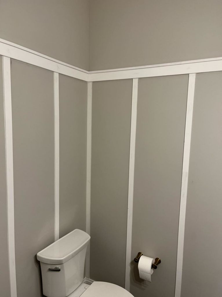 Board and batten wainscoting installed around a toilet area by Jeff of all Trades LLC in Carmel, IN