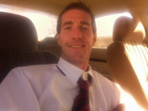 Inside a toilet tank showing the flushing mechanism, a common plumbing repair by Cedar Rapids On Call Handyman Service in Cedar Rapids, IA