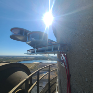 Specialized equipment being installed on a large tower by Fuellgraf Chimney & Tower in Nashville, TN.
