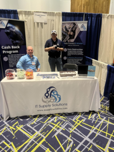 A trade show booth promoting e-waste recycling and data destruction services by I.T. Supply Solutions in Florence, KY.