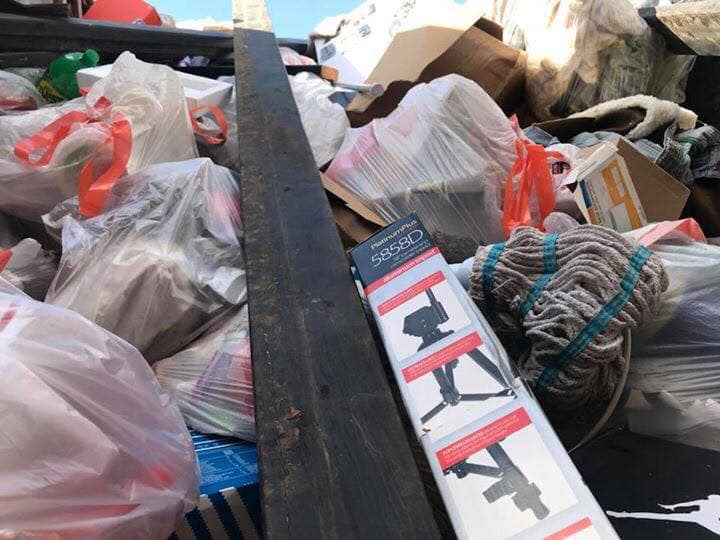 A trailer filled with miscellaneous junk and debris, ready for hauling by El Paso Junk Removal and Hauling in El Paso, TX.