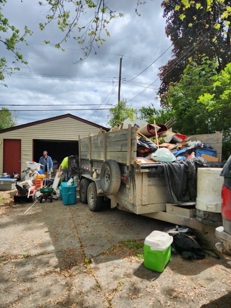 A large trailer filled with household junk and debris during a general junk removal job by CC JUNK Removal in Corpus Christi, TX.