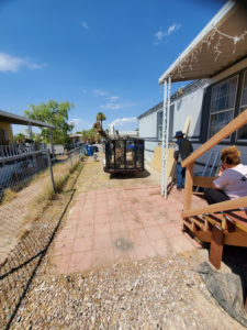A utility trailer loaded with construction debris and various junk items during a removal job by V.S.C Junk Removal Services in Las Vegas, NV.