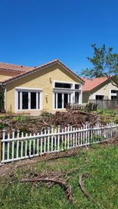 Extensive tree debris after a trimming job by Florida Tree Cutters, showcasing their work in Fort Lauderdale, FL