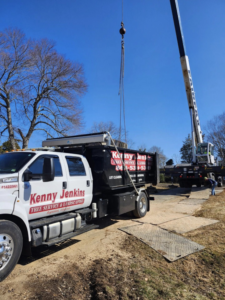 A Kenny Jenkins Tree Service & Landscaping, LLC dump truck and crane set up for tree removal in Rapidan, VA.
