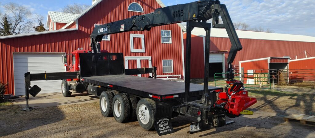 Broken Branch Tree Removal's specialized crane truck and grapple saw equipment in Broadalbin, NY.