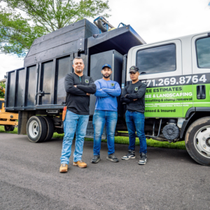 Benjamin R Landscaping & Tree Service crew with their dump truck, ready for tree cutting and stump removal in Roanoke, VA.