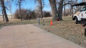 A tree service truck and safety equipment set up for a job by Riverdale Tree Services in Northglenn, CO.