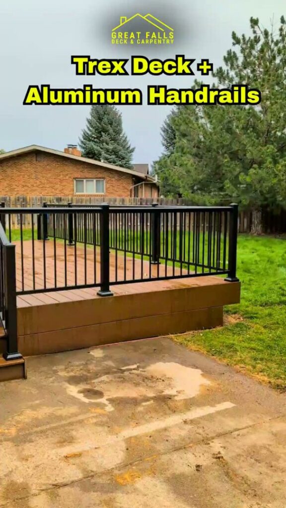 A durable Trex deck complemented by modern aluminum handrails, installed by Great Falls Deck & Carpentry in Great Falls, MT.