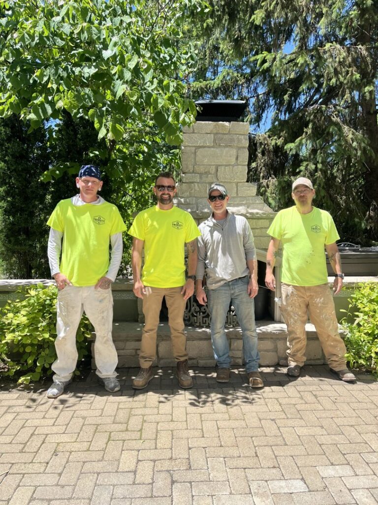 The professional team from Tribute Painting & Drywall standing together in St. Louis, MO.