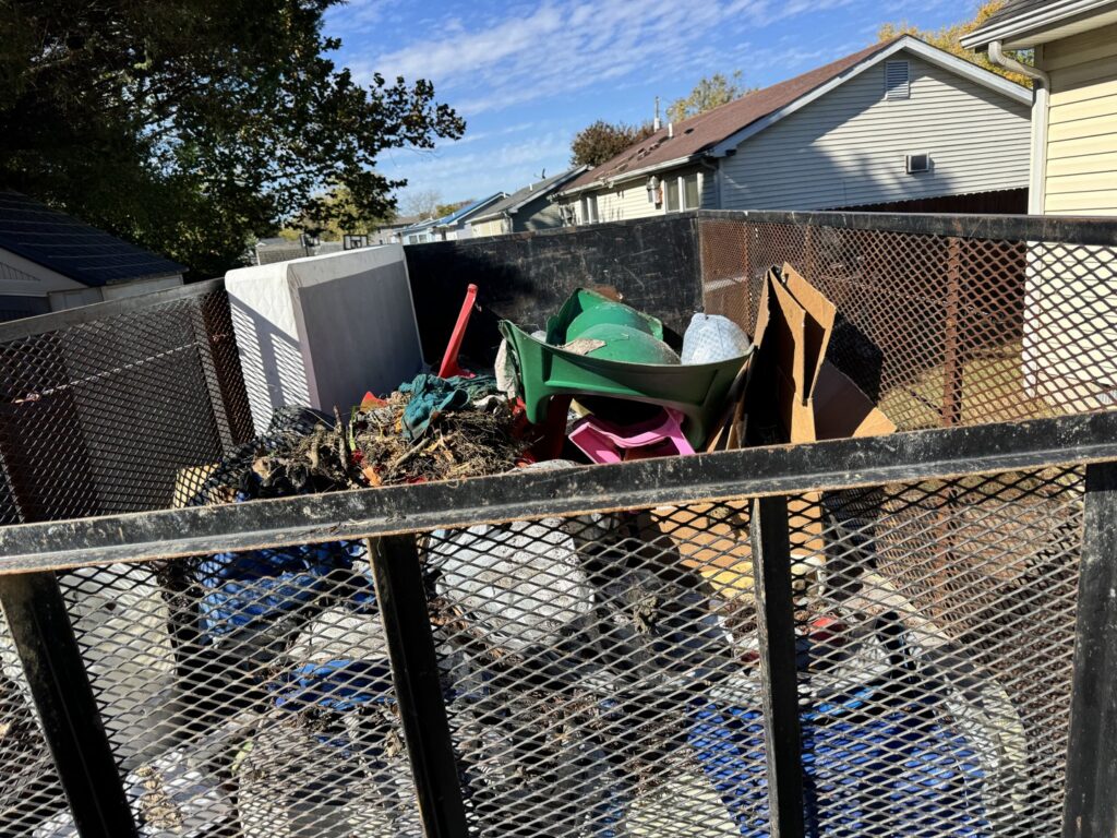 A truck bed filled with various junk items and debris for removal by Insta Junk Removal & Demolition LLC in Salisbury, MD