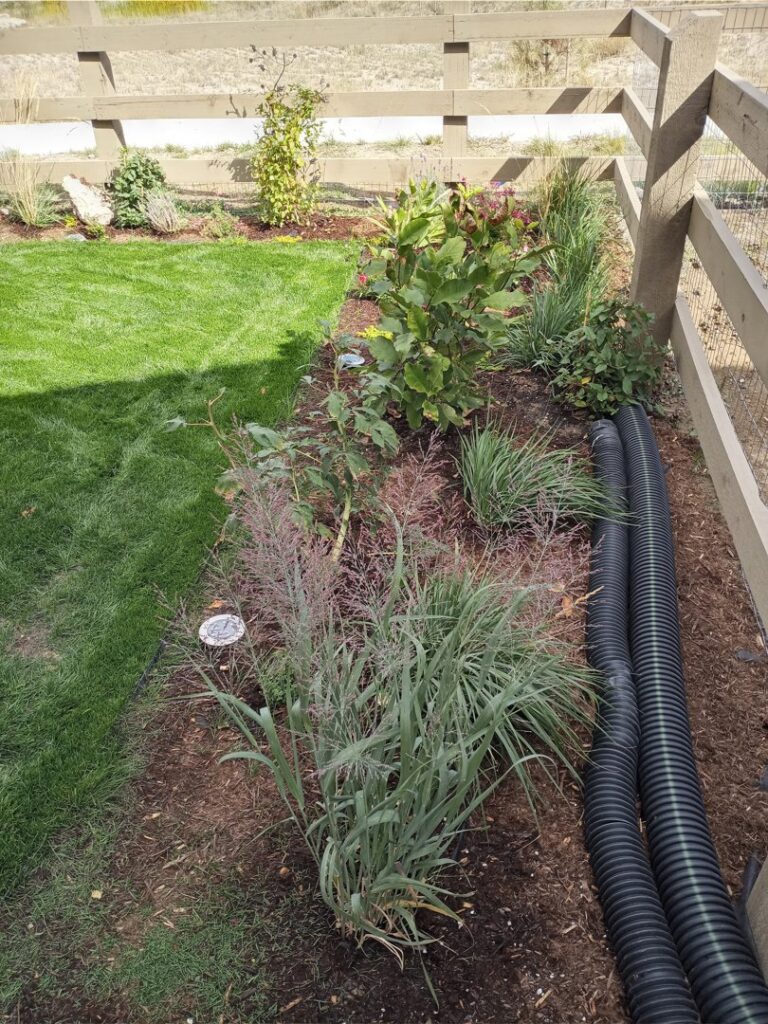 A pickup truck loaded with construction debris, including a large toilet box and other items, for removal by We R Trash Inc. in Loveland, CO