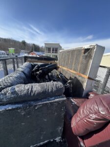 A truck bed loaded with old furniture and debris, ready for removal by K & W Materials & Recycling LLC in Springfield, MA.