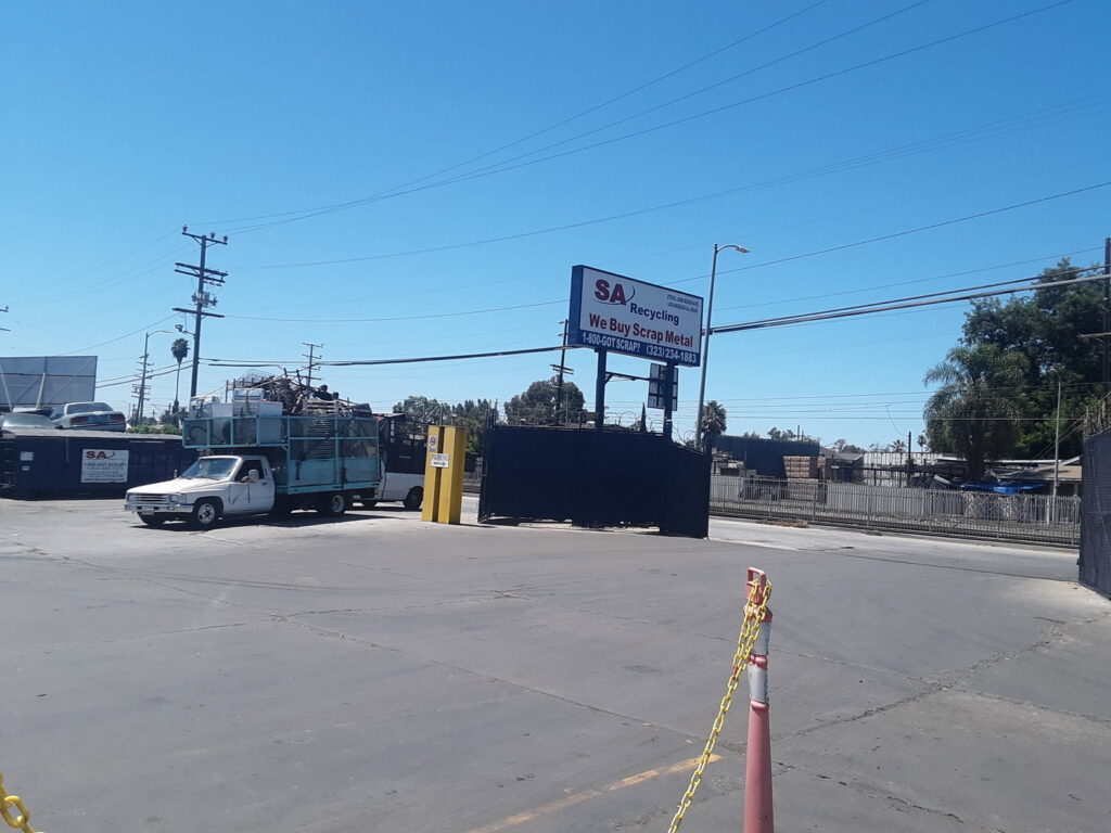 Trucks carrying scrap metal entering the SA Recycling - Long Beach Ave facility in Los Angeles, CA.