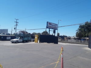 Trucks carrying scrap metal entering the SA Recycling - Long Beach Ave facility in Los Angeles, CA.