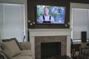 Professional TV mounting service above a fireplace by My Handyman of Wichita KS in Kechi, KS.