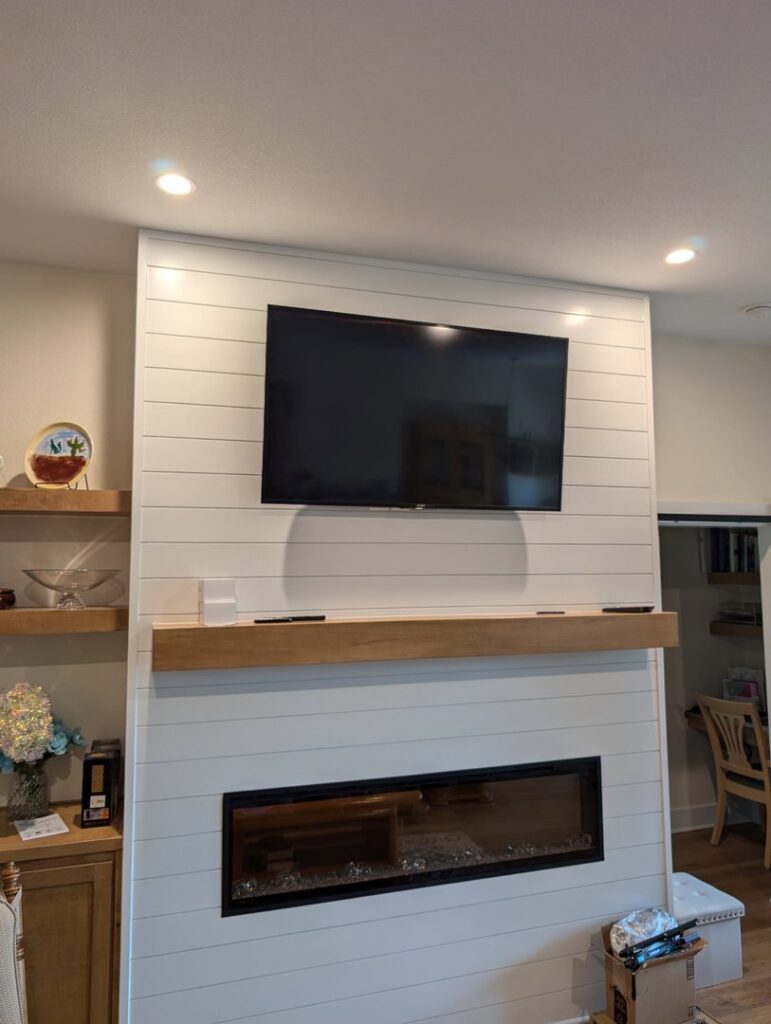 TV mounting and shiplap fireplace installation by My Handyman of Wichita KS in Kechi, KS.