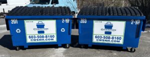 Two blue commercial dumpsters provided by Champion Waste Services for businesses in Londonderry, NH.