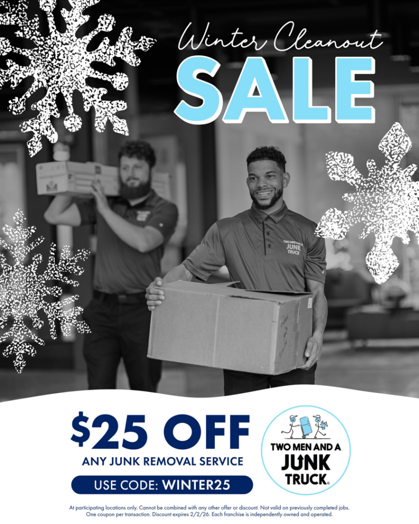 Two Men And A Junk Truck crew members carrying boxes during a junk removal service in Miami, FL.