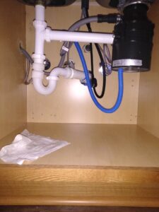 Under-sink plumbing and garbage disposal installation or repair by Holy City Remodel in North Charleston, SC.