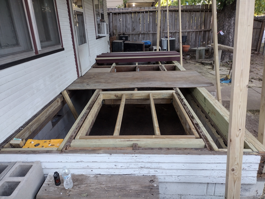 The underlying structure of a porch deck during repair or construction by Do-N-All Handyman Service in Wichita, KS.