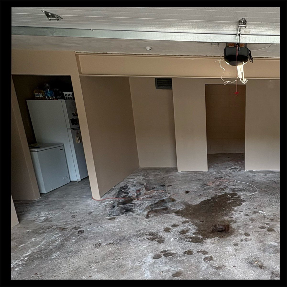 An unfinished basement or garage space ready for renovation by Legacy Full Service Contracting LLC in Brackenridge, PA.