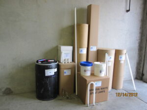 Various containers of universal waste lamps collected for recycling by Quick Light Recycling in South San Francisco, CA.