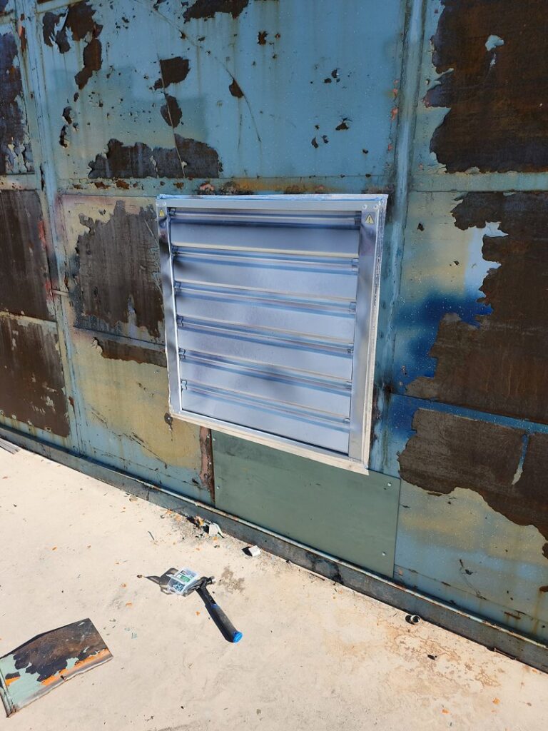 A new vent installed in a metal wall, a service provided by Joe's Handyman Solutions in Ogden, UT.