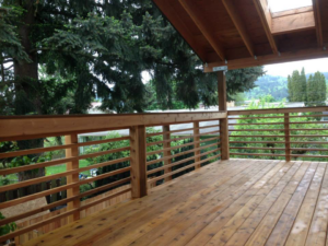 A view from a newly constructed wooden deck, showcasing quality craftsmanship by Fine Hand LLC in Portland, OR