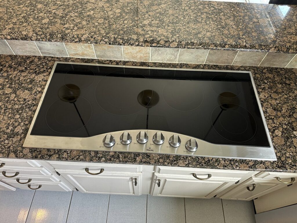 A large Viking brand cooktop professionally installed in a kitchen by R&J Handyman Services LLC in Warwick, RI.
