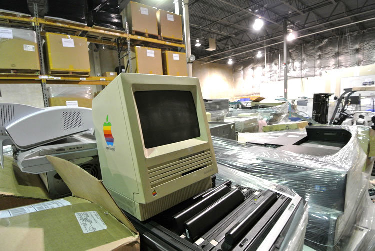 Vintage Apple Macintosh computer and other old electronics awaiting recycling at Securis in Greensboro, NC