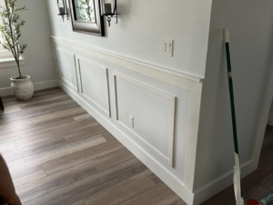 Newly installed wainscoting and trim work on a wall by IGM Handyman Services in Meridian, ID.