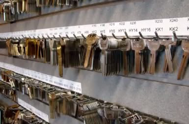 A wall display showcasing a wide variety of key blanks available for duplication at MX Locksmith in North Las Vegas, NV.