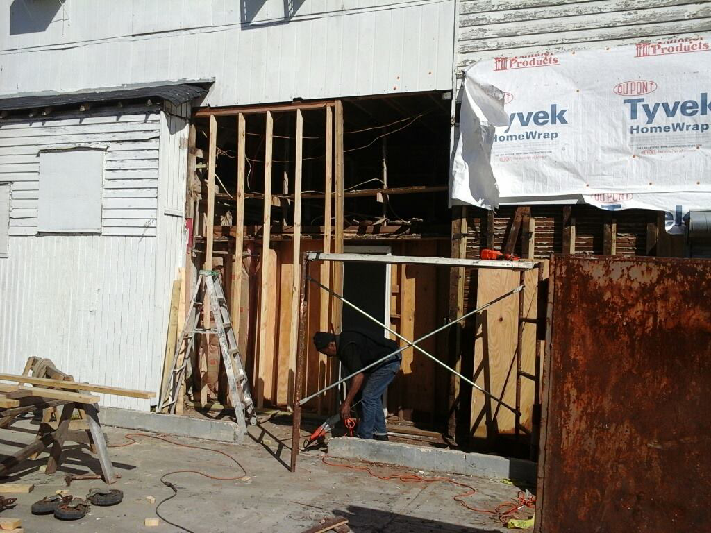 A handyman performing wall framing and renovation work for Anderson Builders, LLC in Twin Falls, ID