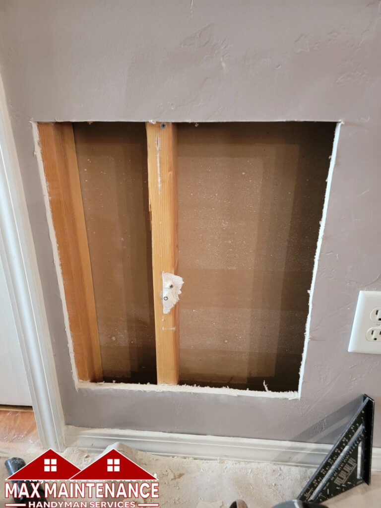 Wall framing and repair in progress by Max Maintenance in Twin Falls, ID.