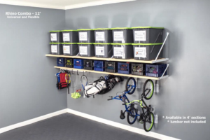 Installed wall-mounted garage shelving with storage bins and a hanging bike rack by Bend Garage Storage Solutions in Bend, OR