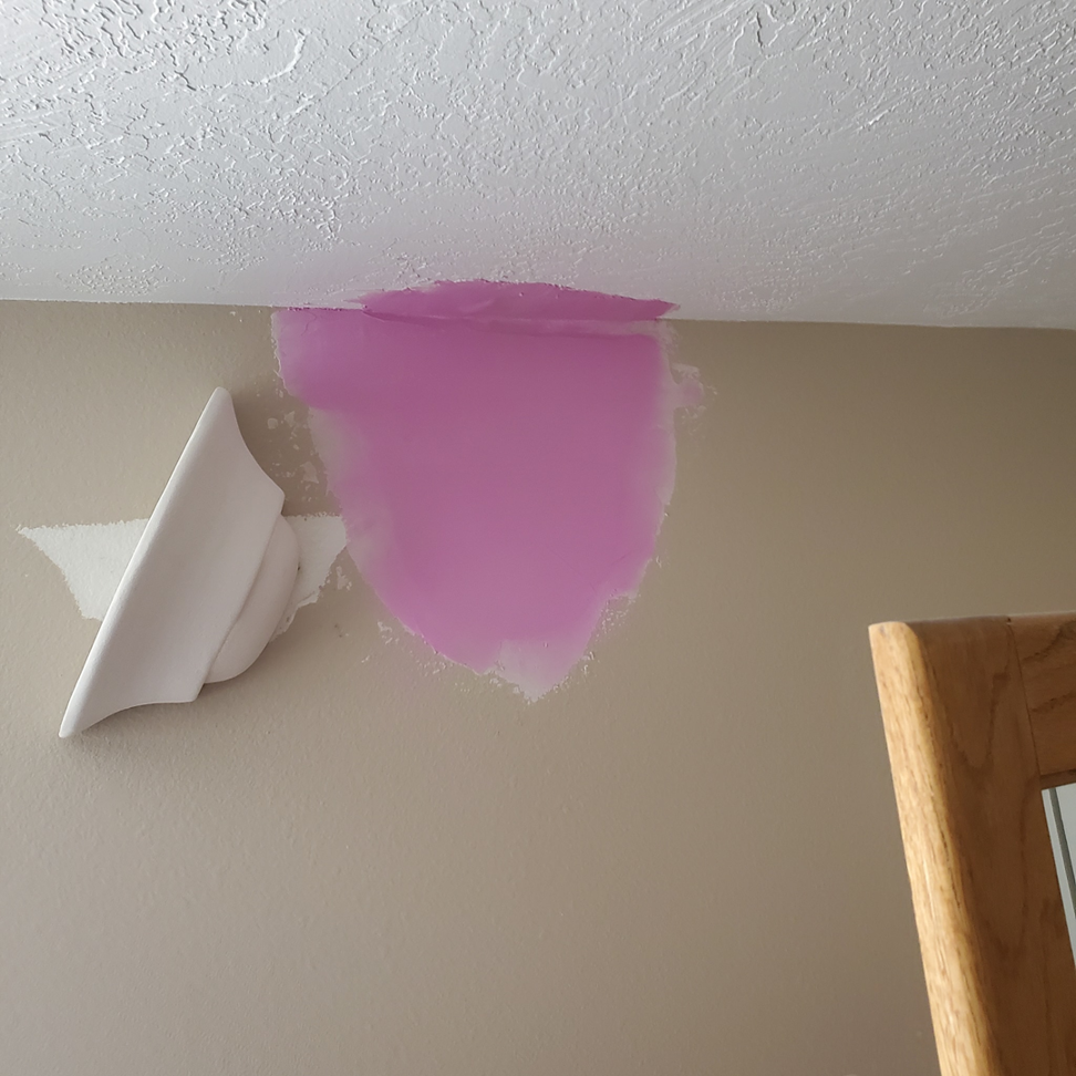 Wall repair and patching in progress by Papa Bear's Home Care in West Valley City, UT.