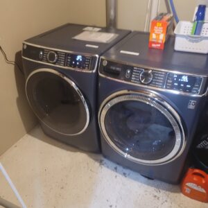 A newly installed washer and dryer set in a laundry area by Amazing Handyman Services in West Fargo, ND