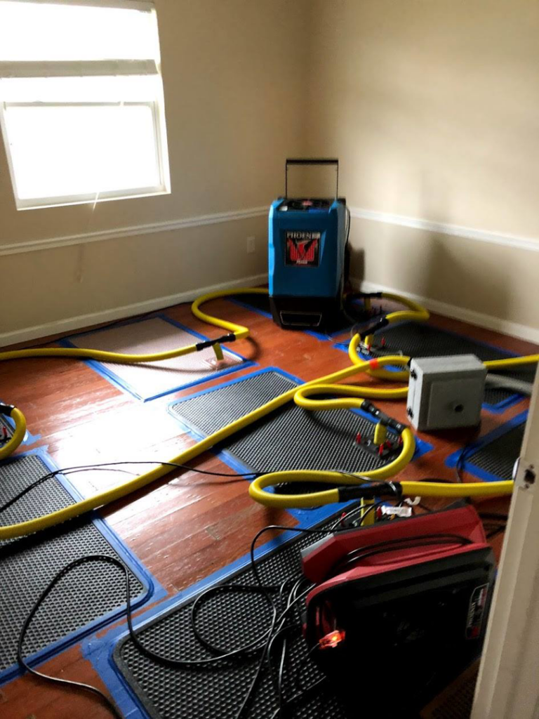 Water damage drying equipment set up in a room by ProTouch Restoration in Minneapolis, MN.