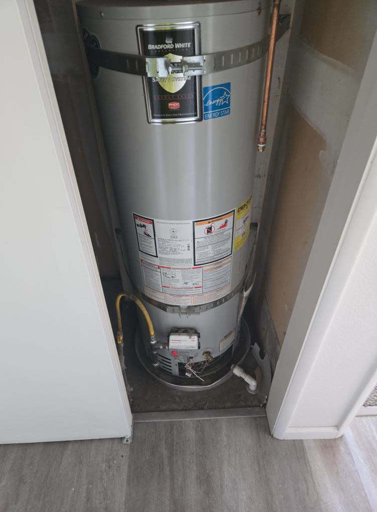 A new Bradford White water heater installed in a utility closet by DMax solutions in Fernley, NV.